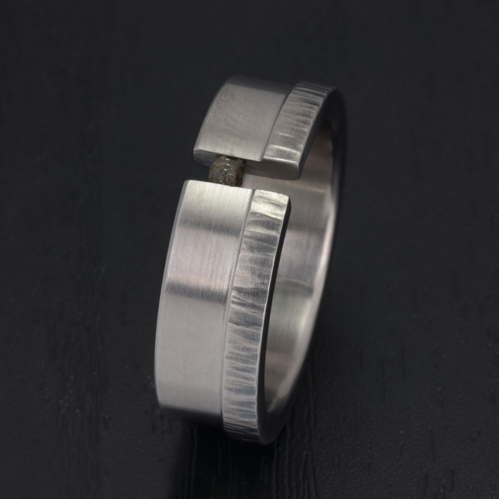 A close-up view showcasing the design of our stainless steel ring with a naturally uncut diamond cube, epitomizing both strength and beauty.