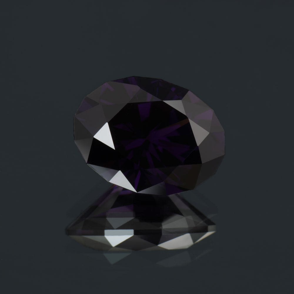An image of a 3.45 carat dark purple spinel from Tunduru, Tanzania.