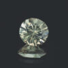 A picture of a shallow oval pale green/blue sapphire, weighing 1.02 carats.