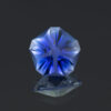 This is an image of a lab-created sapphire cut in the popular, but sometimes rare, Hanami cut.