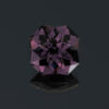 An image of a deep purple spinel, square cut.