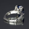 A close-up showing the back and inside of this lab-created blue sapphire 14k white gold ring.